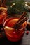 Glass with delicious punch drink on wooden table