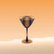 Glass with a drink on the apricot background