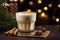 Glass of eggnog covered with layer of whipped cream. Traditional Christmas drink is decorated with cinnamon sticks