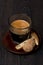 Glass of espresso, biscotti and almond cookies