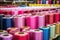 glass fiber spools neatly stacked in a factory