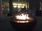 glass fire pit at Christmas at night