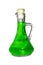 A glass flask with green substance on a white background.
