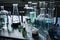 glass flasks, beakers, and test tubes arranged neatly on laboratory table