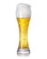 Glass of foamy light beer with bubbles on white background