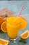 Glass of Fresh Orange Juice with Heart Straw