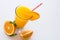 Glass of Fresh Orange Juice With Heart Straw on White