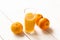 Glass of fresh tangerine juice and fruits on marble table. Glass of orange juice with some tangerines