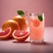 A glass of freshly squeezed grapefruit juice with a wedge of grapefruit as garnish4