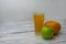 Glass of freshly squeezed green apple and pumpkin juice. Vegan food, detox diet. Healthy food concept. Selective focus, copy space