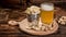 A glass full of beer and foam. Snacks for beer. Typical Brazilian after-work meal with beer. Selective focus