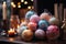 glass gifts and decorations on a wooden table, decorated for Christmas or New Year\\\'s holiday, garlands, a fairy-tale