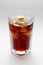 Glass with a glass of Coke rum, cocktai ice cubes