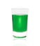 Glass with green absinthe. A small shot glass with green liquid