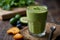 glass of green smoothie next to a green smoothie Revitalize with Green Juice The Detoxifying Smooth
