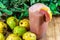 Glass of guava juice (Psidium guajava) and natural fruits