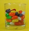 Glass half filled with jellybeans