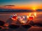 Glass hearts on beach at sunrise