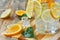 Glass homemade lemonade, ice, orange, lemon closeup