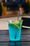 glass of Iced blue hawaii soda on table Blue Lagoon Cocktail