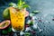 Glass of Iced passion fruit soda with lemon and passion fruit half slice on a light background, refreshing drink or beverage with