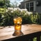 Glass of Iced Tea with a View of a Blooming Garden