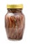 Glass jar of canned anchovy fillets isolated