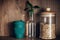 Glass jar with cereals, reusable coffee cup and bamboo leaves on wooden shelf, bulk store shopping. Zero waste concept,