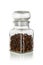 Glass jar with clove isolated