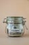 Glass jar full of American currency dollars cash banknote with text EMERGENCY. Preparation saving money. Moderate