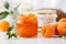 Glass jar with homemade marmalade or jam with apricot fruits