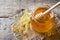 Glass jar of honey, Linden flowers on wooden background