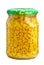 Glass jar with marinated corn grains