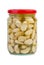 Glass jar with marinated garlic