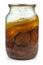 Glass jar with moldy jam on a white