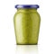 Glass jar with pesto sauce.