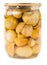 Glass jar with pickled cepe mushrooms