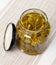 Glass jar with pickled green capers