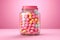 Glass jar with pink candies