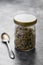 Glass jar with seeds mix. Healthy foods, vegan food ingredient