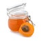 Glass jar with tasty apricot jam on white background