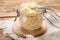 Glass jar of tasty sauerkraut on wooden table, closeup