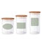 Glass jars with airtight seal wood lids and blank labels. Kitchen goods collection.