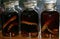 Glass jars with alcohol tincture on poisonous snakes