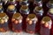 Glass jars with apple compote. Blurred background. View from above