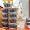 Glass jars with black sturgeon caviar and jar of vodka. Luxurious black caviar