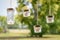 glass jars with candles hanging from twine