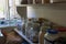 Glass jars full of provisions in a country pantry. Jars and tubs of all shapes and sizes
