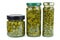 Glass jars with marinated capers isolated on the white