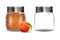 Glass jars with peach jam and empty